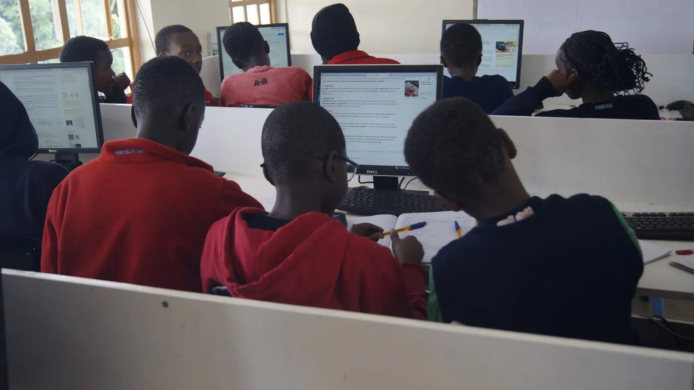 Students working at desktop computers in the ICT lab