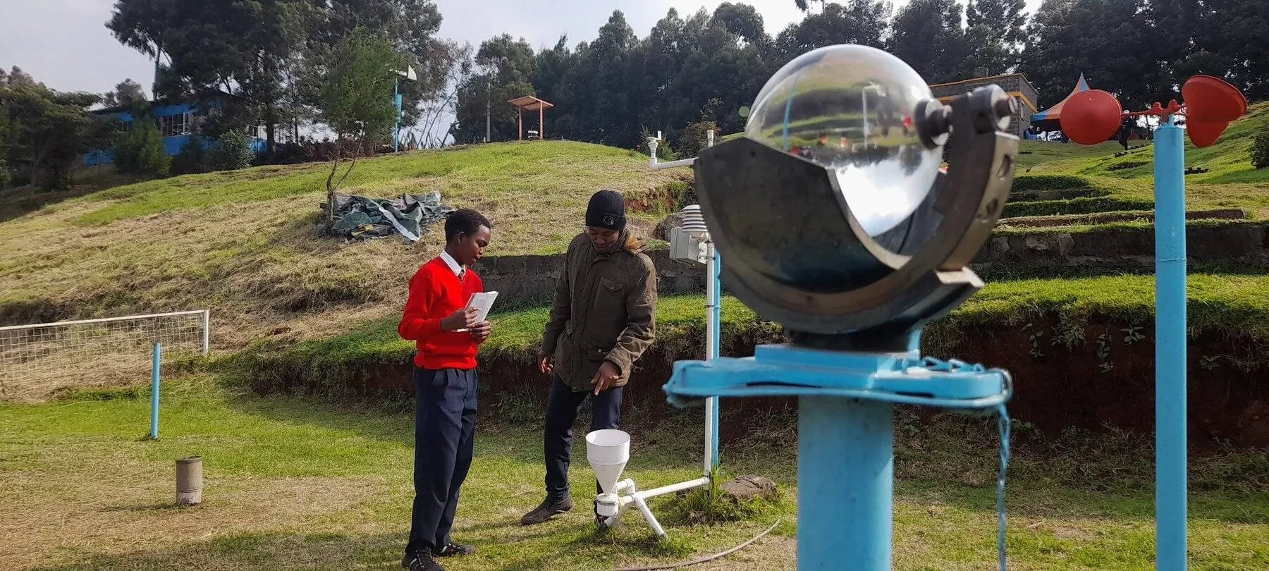 An outdoor STEM demonstration with a parabolic solar cooker